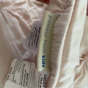 Pottery barn twin comforter and Monique Lhuillier bed skirt. Blush pink.